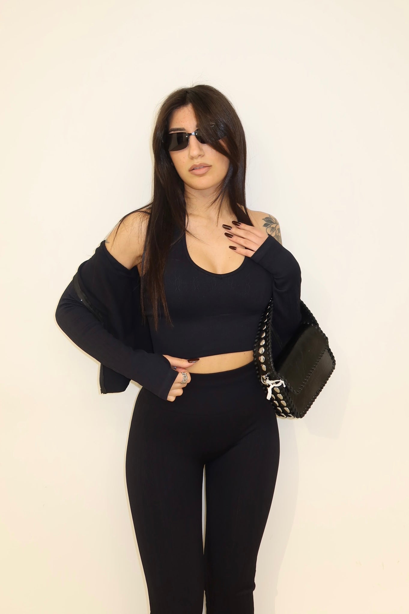 Coord-set nero felpa\corpetto\pantalone effetto trecce